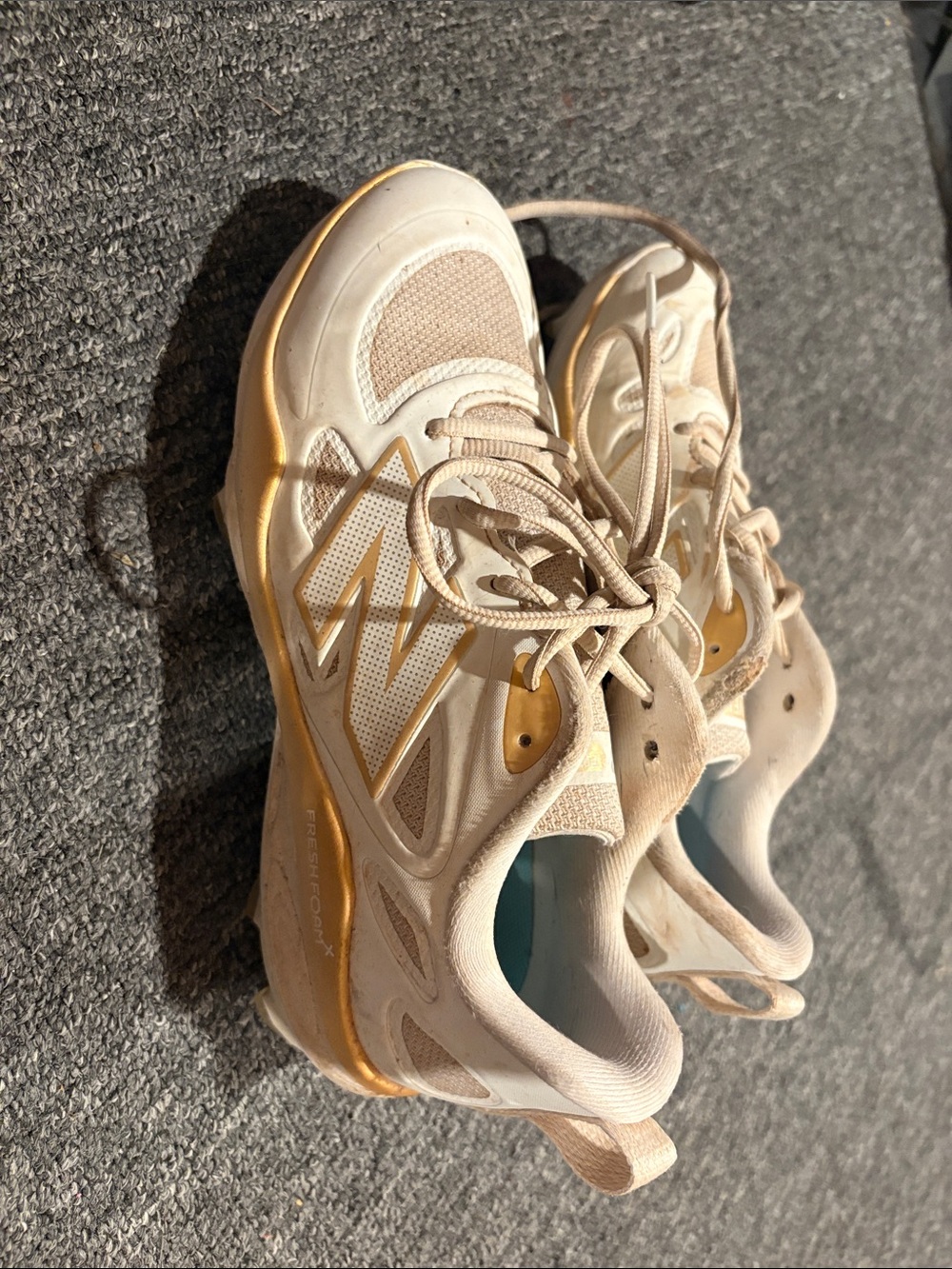 New Balance white and Gold Women's softball cleats